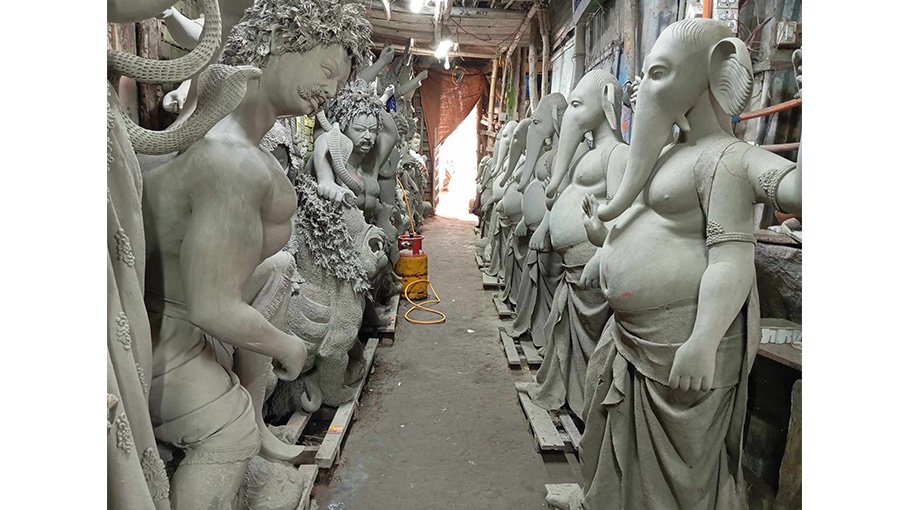 Artisans busy making idols for Durga Puja in Raozan