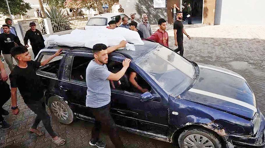 Israeli strikes kill 52 in Gaza including 33 in a school