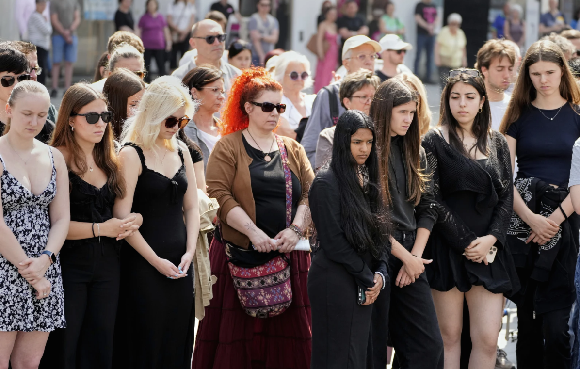 Austria falls silent for a minute as questions remain about the motive for a deadly school shooting