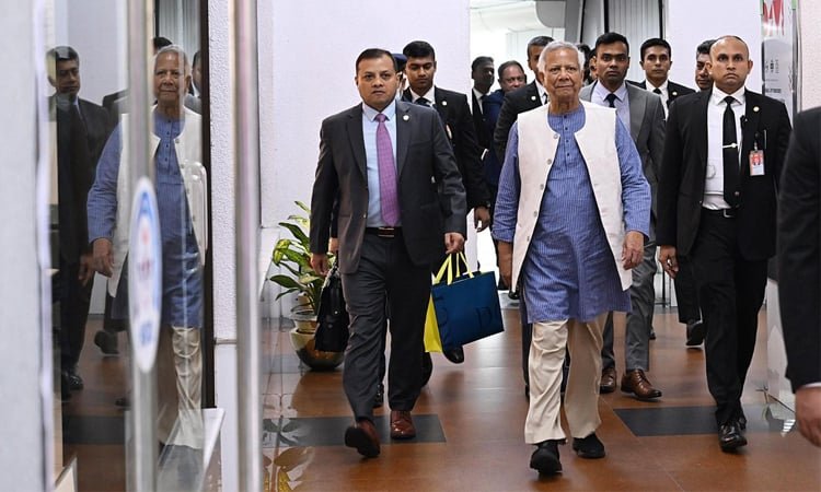 Dr Yunus returns home from London
