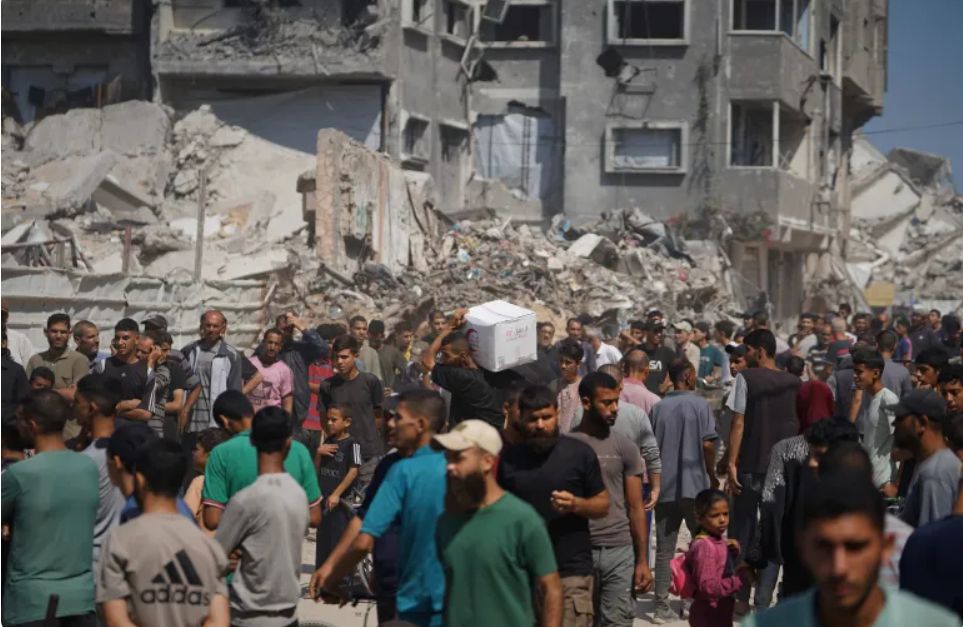 Israeli attacks kill 62 Palestinians in Gaza, including three near aid site