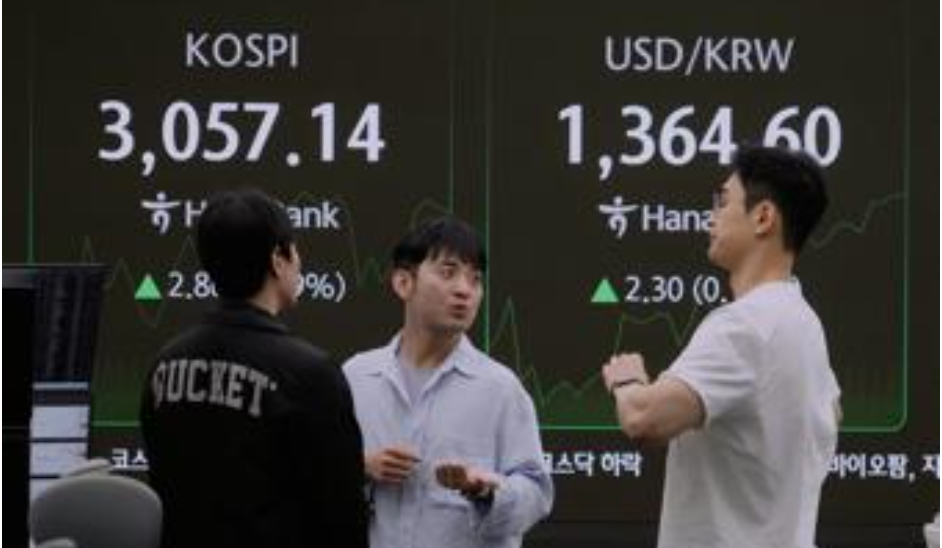 Asian shares mostly down as Trump’s tariff deadline nears