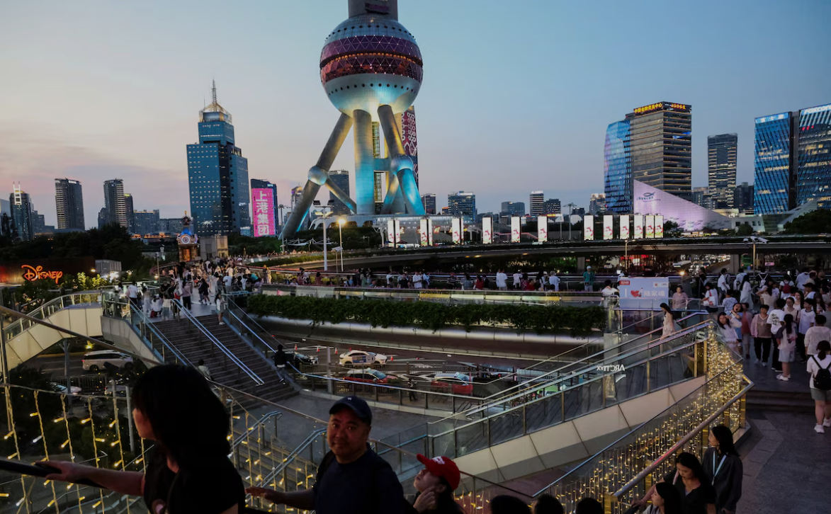 China's economy slows as consumers tighten belts, US tariff risks mount