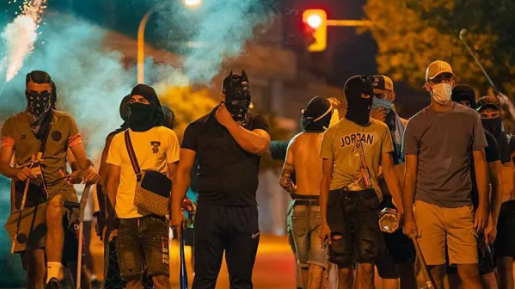 Masked rioters attack highway in France