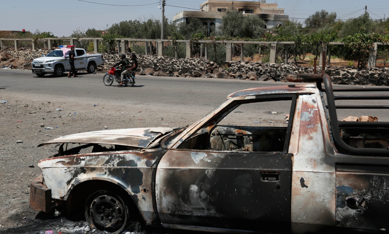Fresh clashes break out in Syria as the interim government struggles to ease tensions
