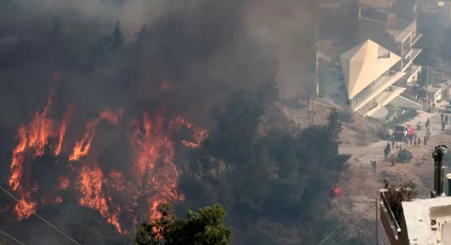 Firefighters battle blaze near Athens for second day