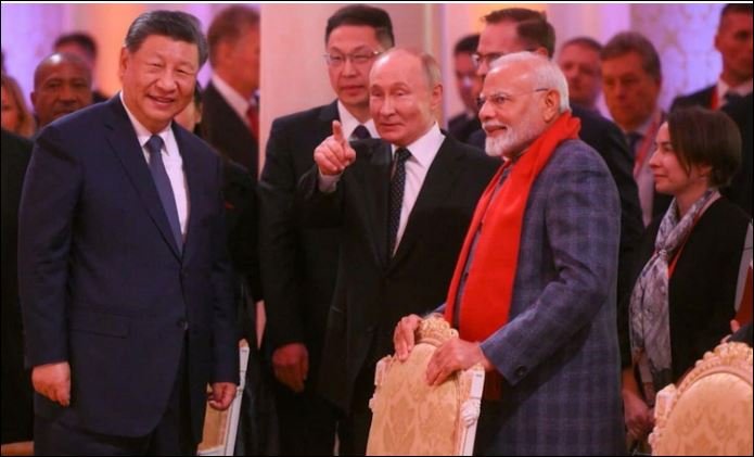 Putin and Modi in China for summit hosted by Xi