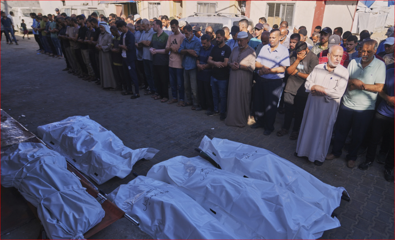 Strikes across Gaza kill at least 31 as international scholars accuse Israel of genocide