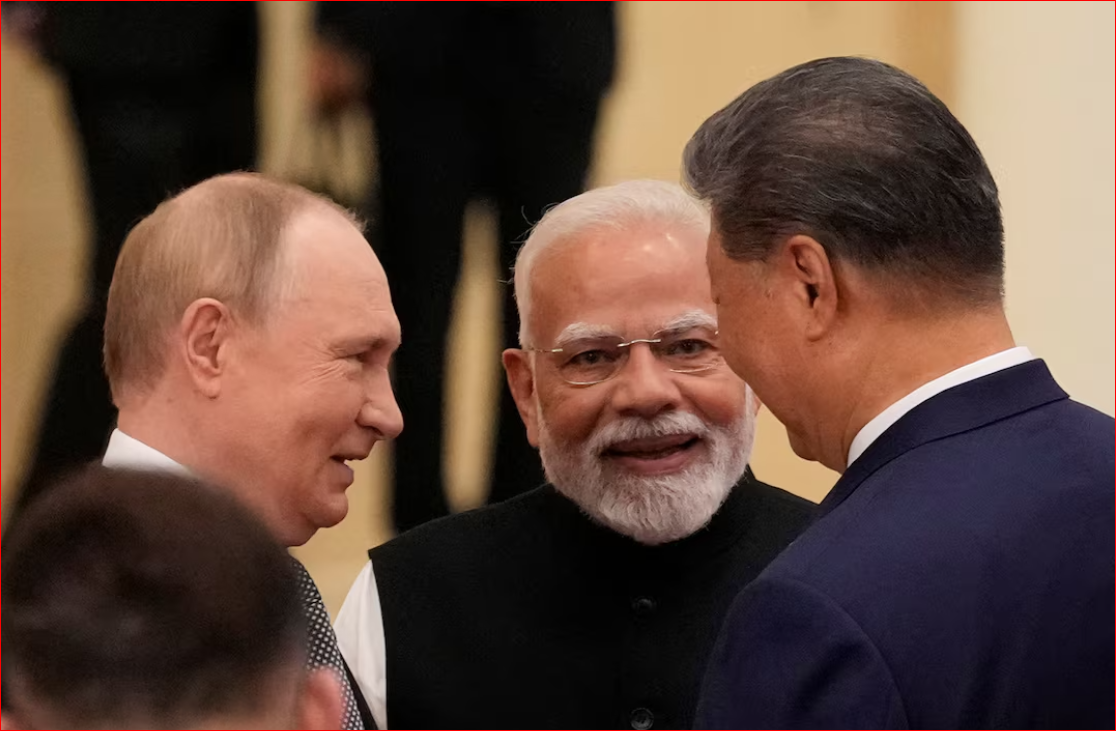 China President Xi pushes a new global order, flanked by leaders of Russia and India