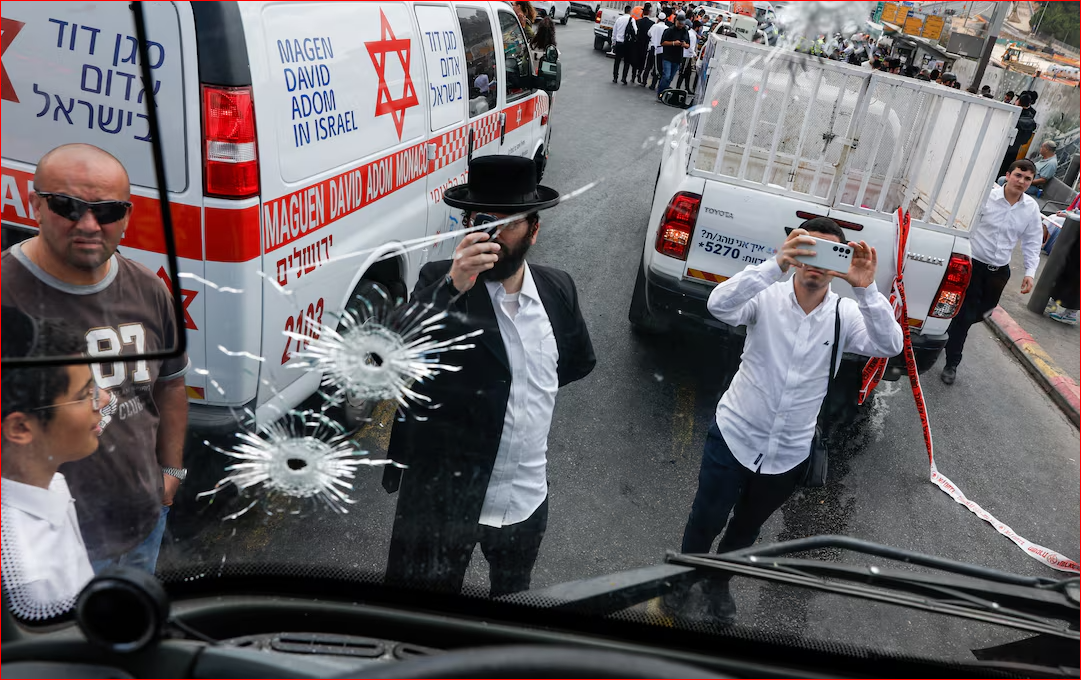 Palestinian gunmen kill six in Jerusalem bus stop shooting