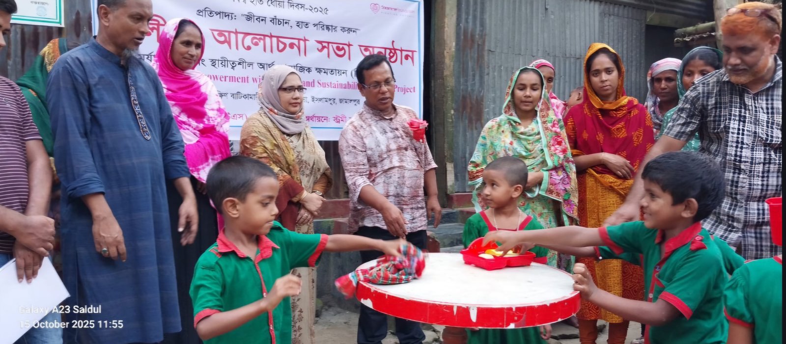 Children teach handwashing techniques to adults on Global Handwashing Day in Jamalpur
