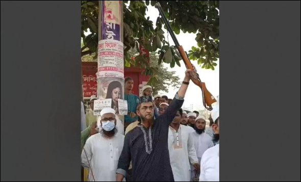 Man arrested for brandishing dummy rifle during rally in Turag