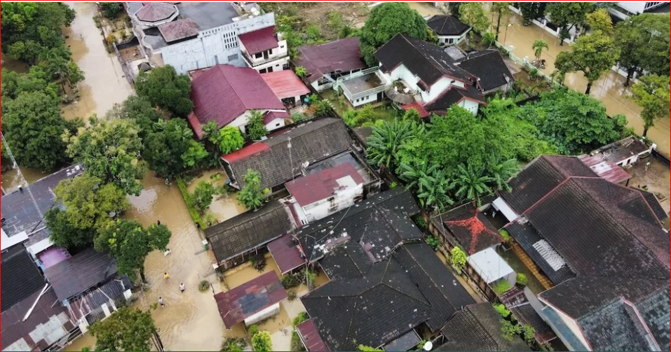 Flood and landslides in Indonesia kill dozens