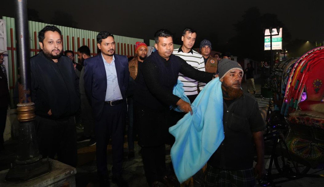 Chattogram DC distributes warm clothes among poor people