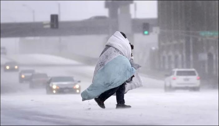 Massive winter storm sweeps across US bringing ice, frigid temps