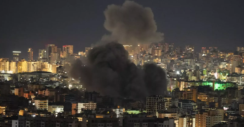 Iran launches new wave of strikes, claims attack on US base in Kuwait