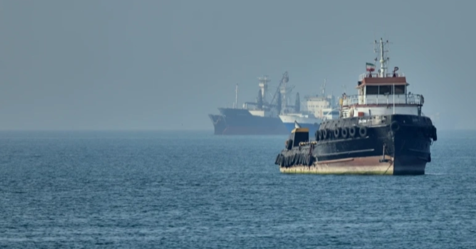 Iran warns the US against attacks on its vessels as fragile ceasefire holds