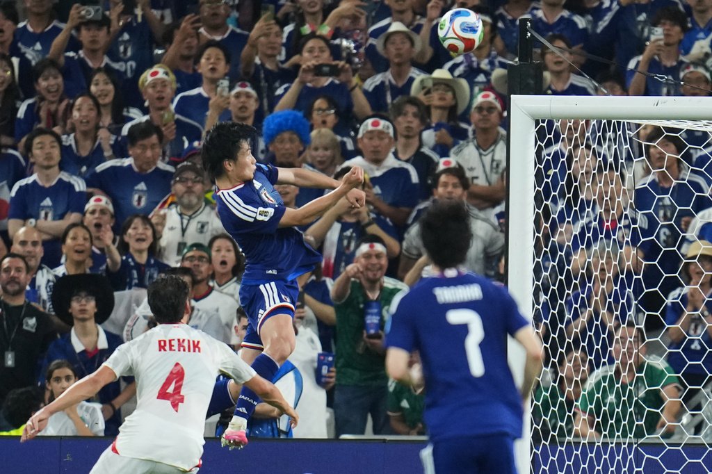 Japan thrash Tunisia 4-0 as Ueda scores twice