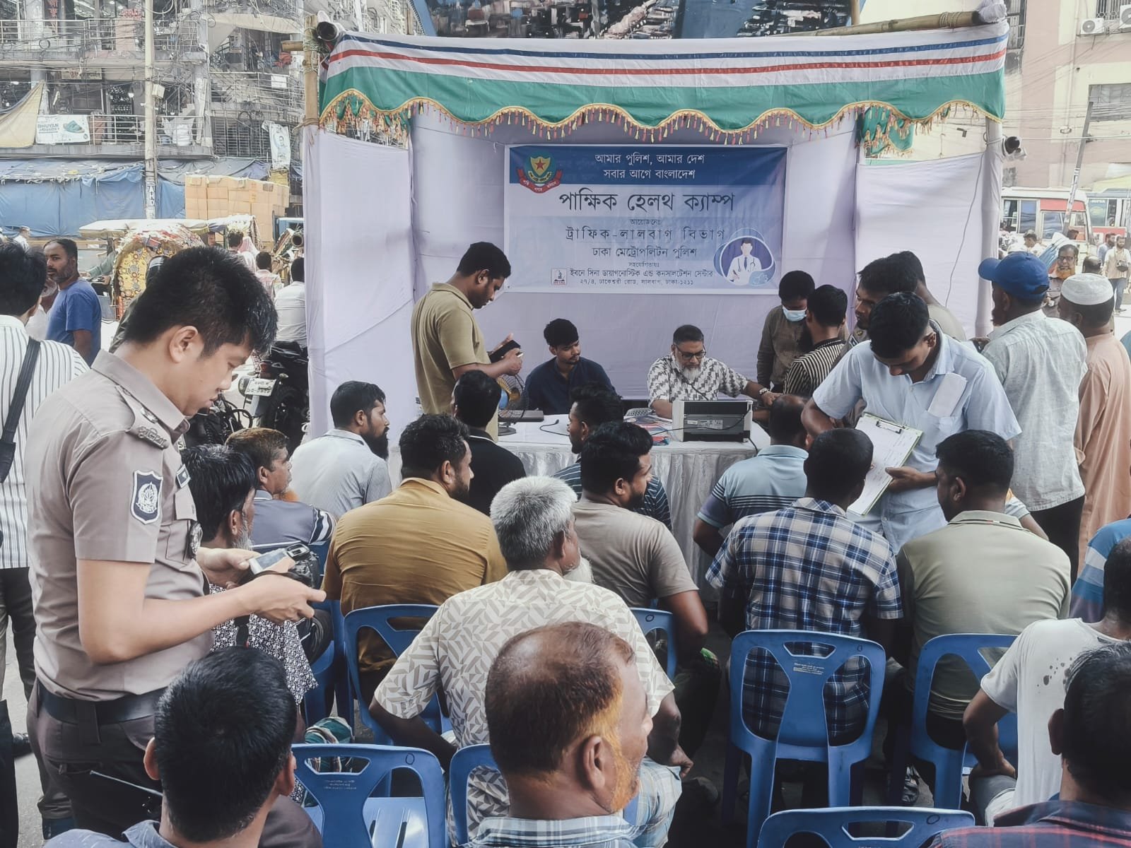 Free health camp held for drivers at Fulbaria Bus Terminal