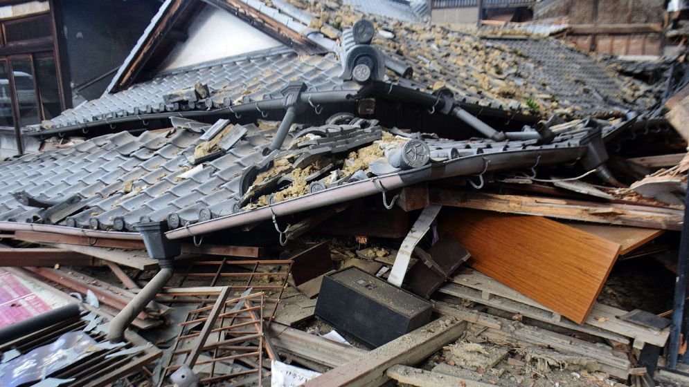 Japan earthquake kills 13, search for survivors continues